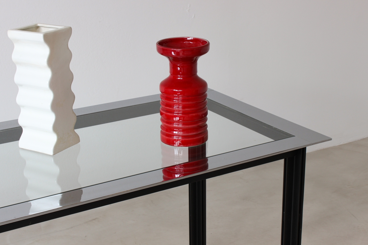 Luigi Caccia Domignoni Console con piano in vetro con fascia in metallo cromato. Produzione Azucena, 1970ca