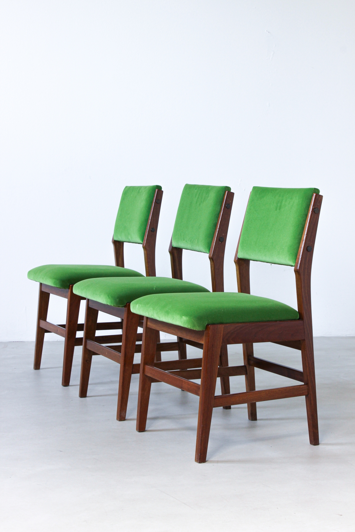 Six chairs with wooden structure and seat and back in padded fabric.  Attribution Gio Ponti 1950s.