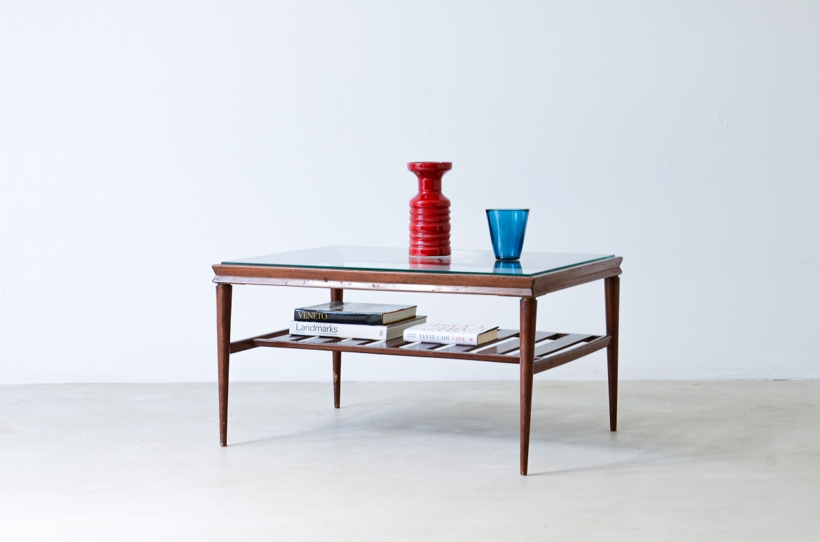 Elegant low table in polished wood with ground glass top and slatted shelf.  Italian manufacture, around 1950.