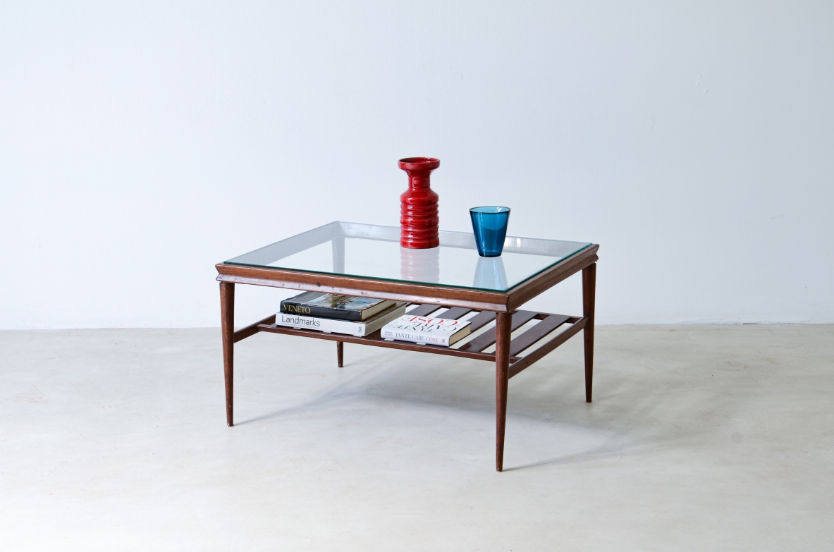 Elegant low table in polished wood with ground glass top and slatted shelf.  Italian manufacture, around 1950.