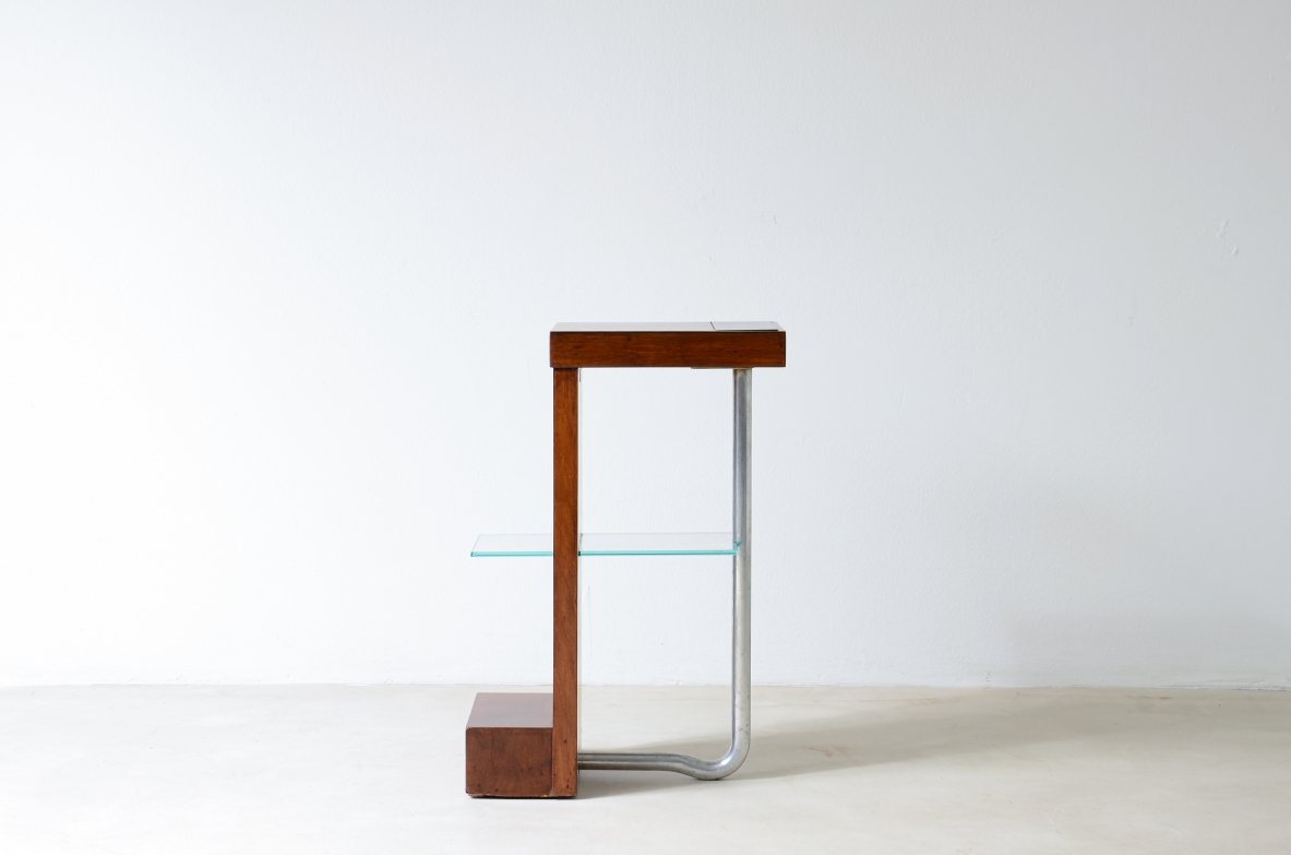 Armando Melis de Villa  Side table in polished wood with curved metal leg.  Designed for the Royal insurance company of Turin.  Italian manufacture, 1930's.