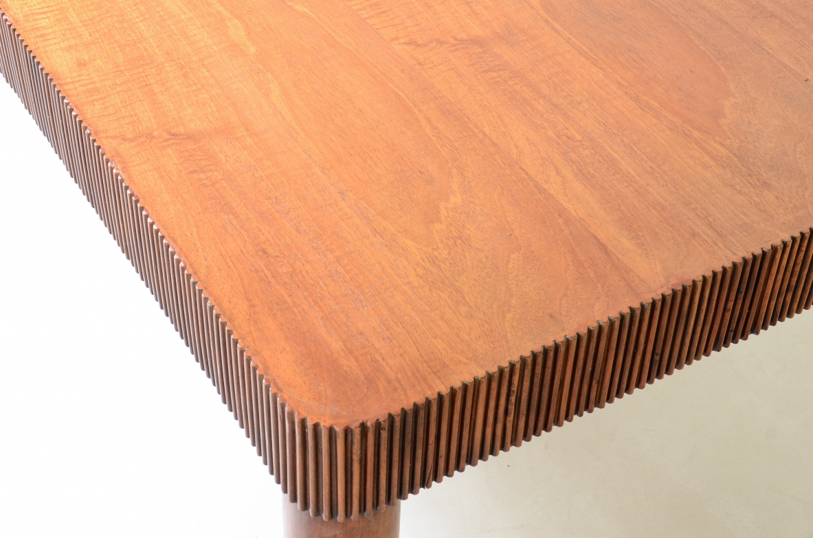 Elegant table with band motif in grissinato wood, top in walnut wood, turned legs with carved wooden tips.  Italian manufacture approx. 1940's.