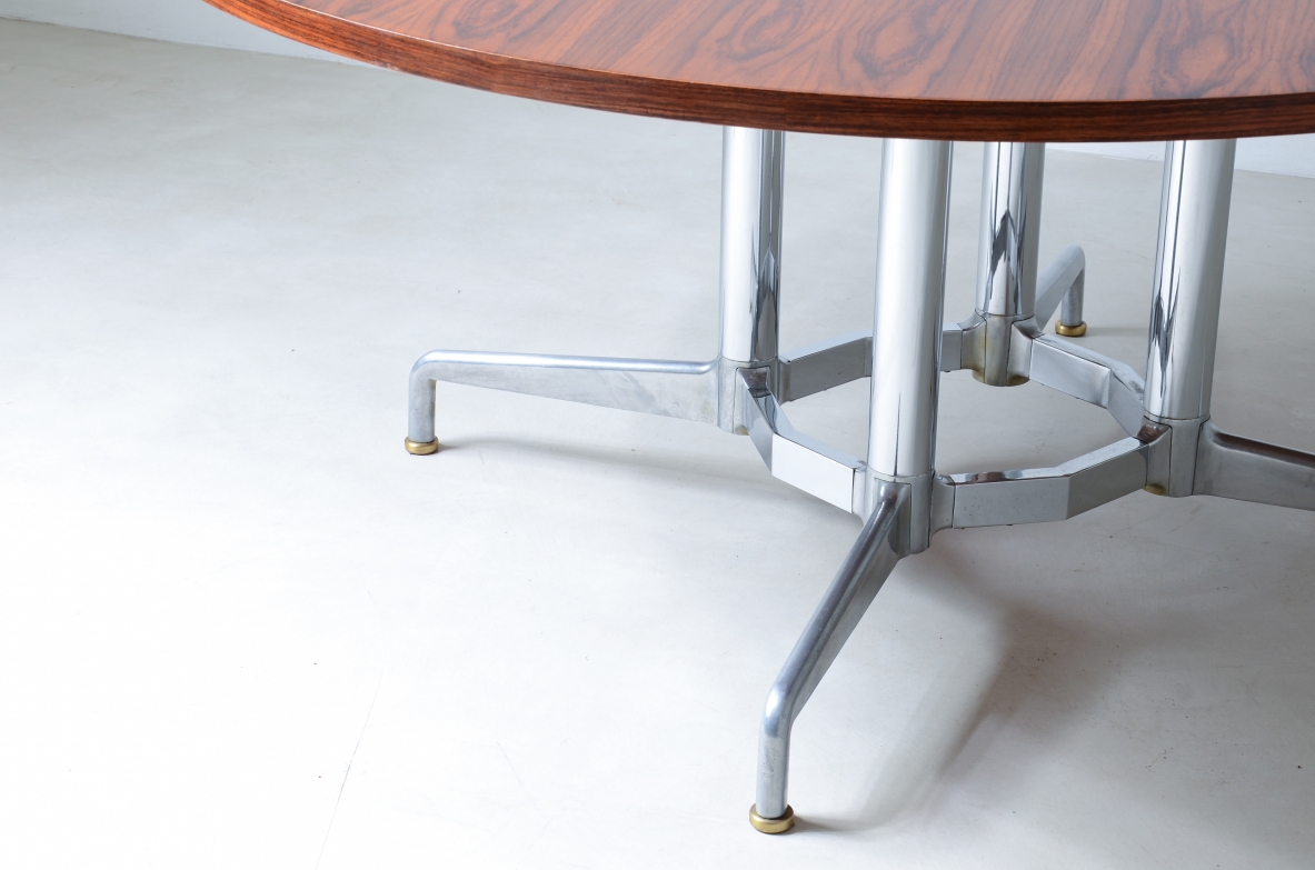 Italian 1960's round table, with a nice chromium plated base and wooden top.