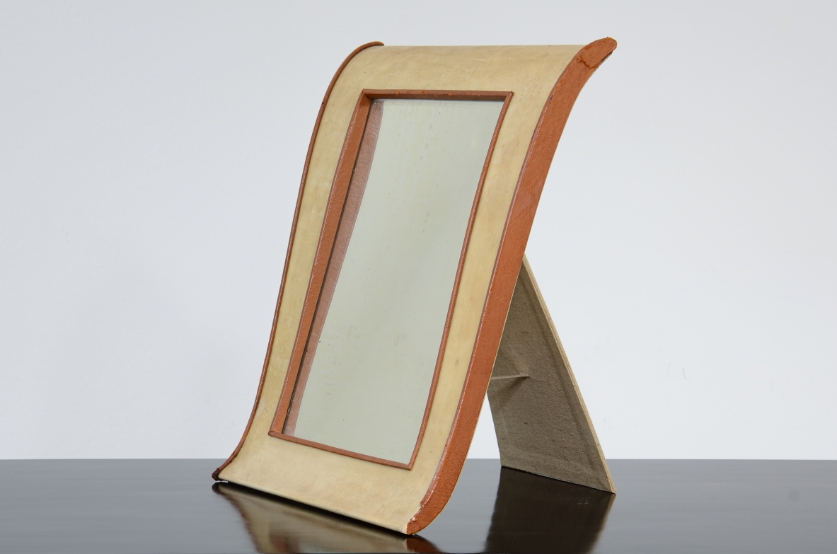 Table mirror with parchment frame.  Italian manufacture,1940's.