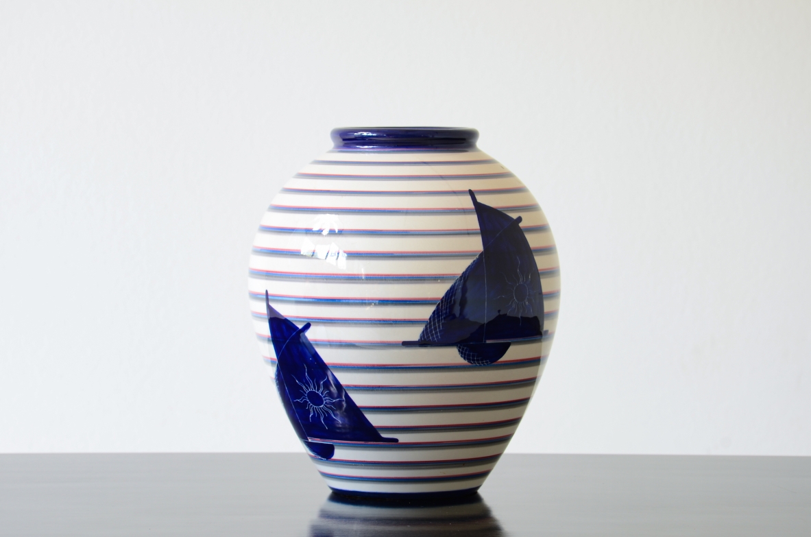 Ceramic vase with sailing boats on a banded background produced by Società Anonima Ceramiche Rometti Umbertide, design by Corrado Cagli and Dante Baldelli, 1928/30, signature engraved at the base.