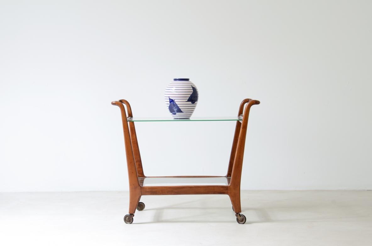 Carlo Hauner (1927-1996) Walnut wood trolley with glass tops and wheels in the style of Gio Ponti.  Italy, 1950