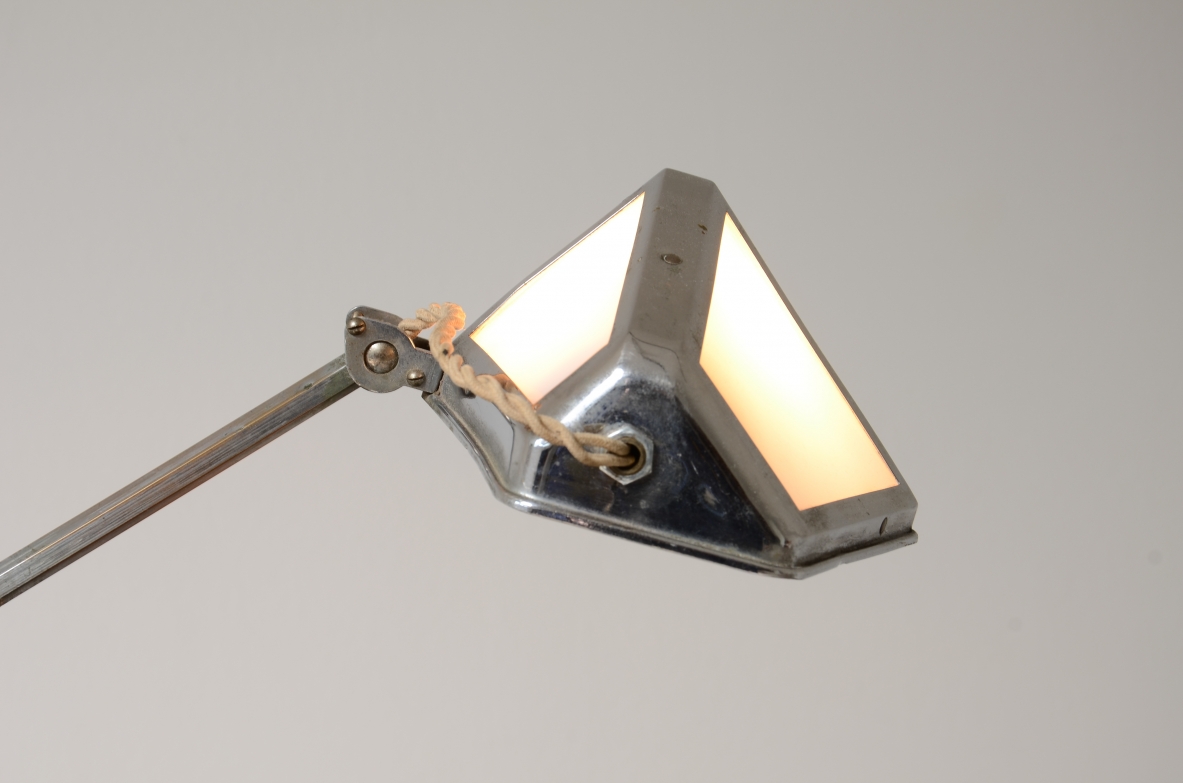 Table lamp in chromed metal and opal glass. 