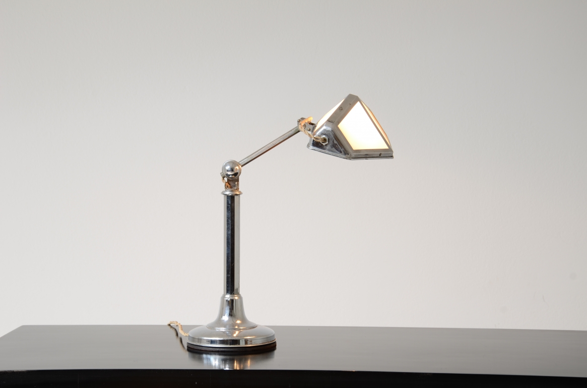 Table lamp in chromed metal and opal glass. 