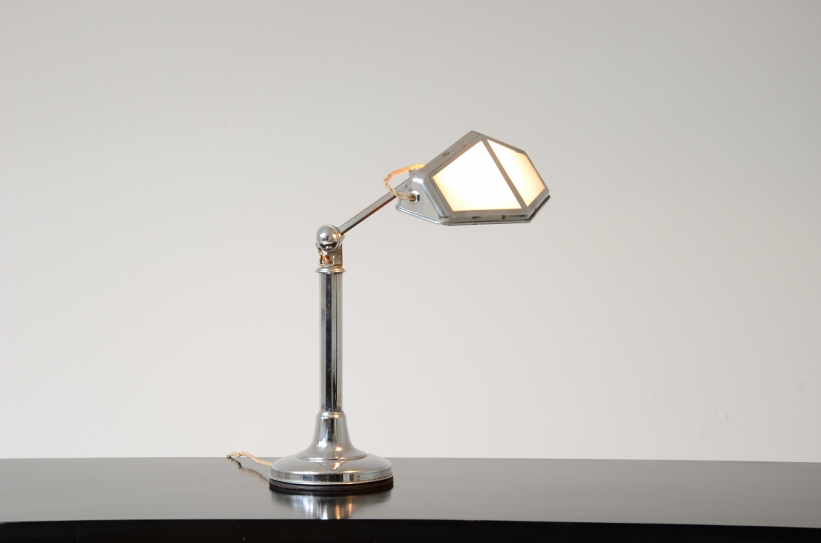 Table lamp in chromed metal and opal glass. 