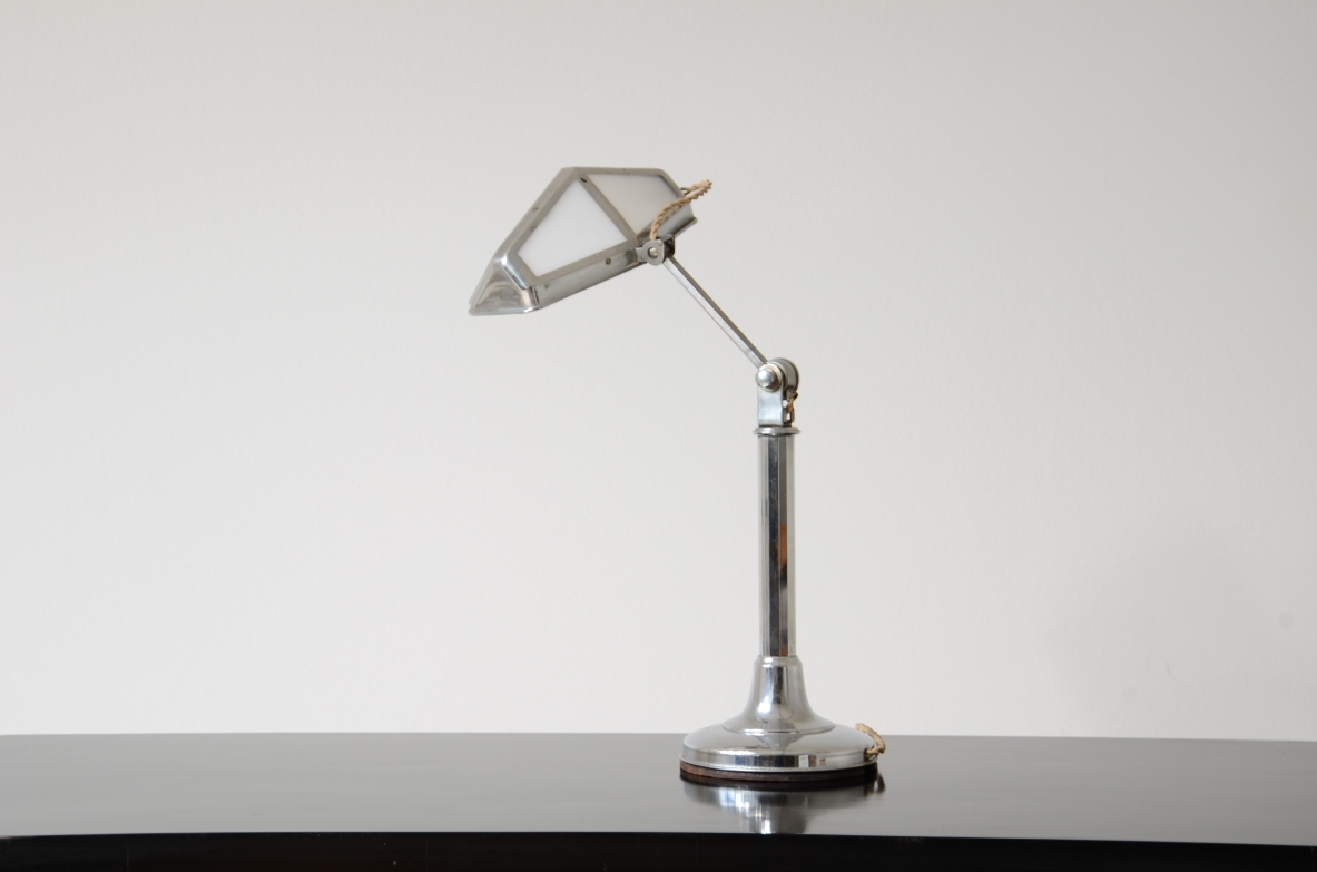 Table lamp in chromed metal and opal glass. 