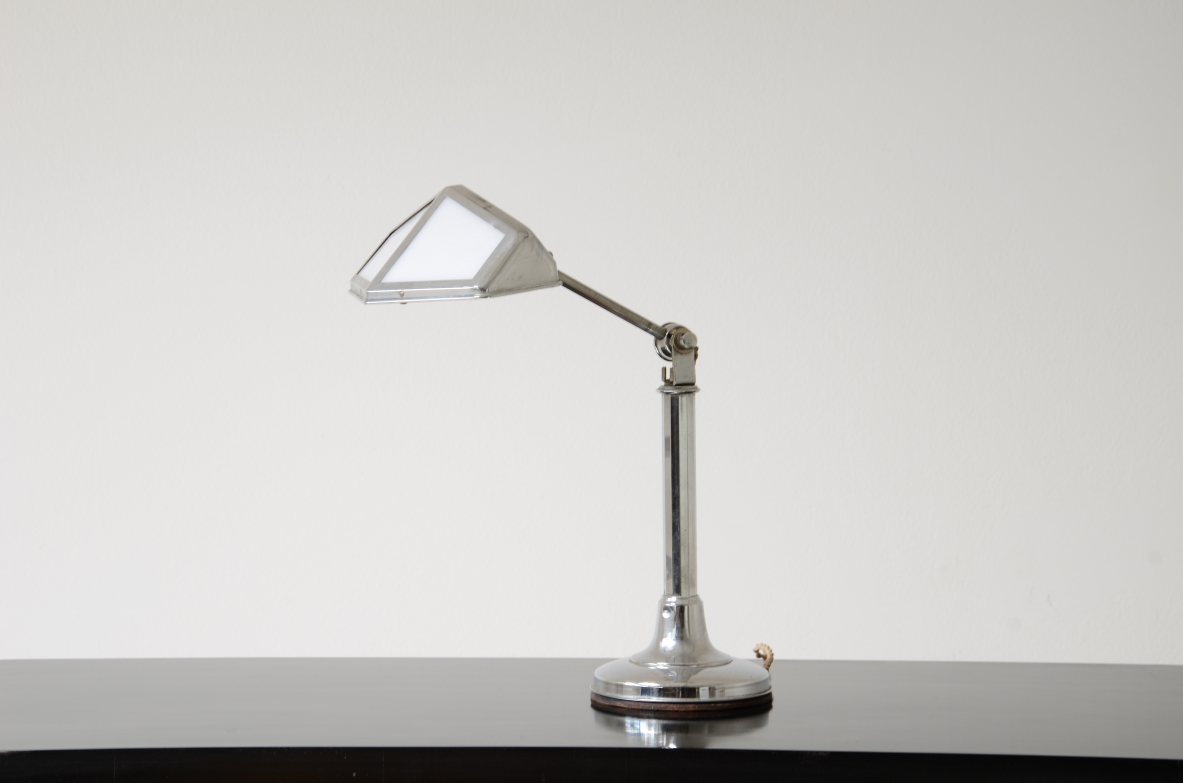 Table lamp in chromed metal and opal glass. 