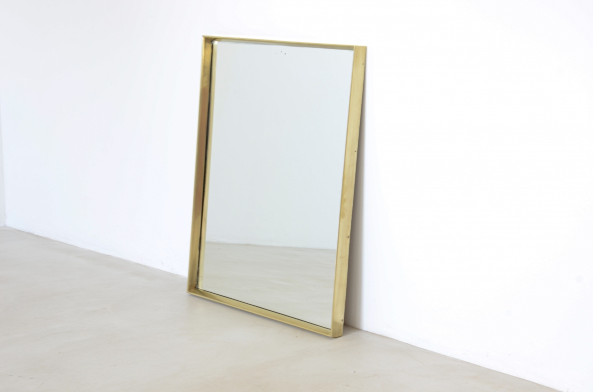 Shaped brass mirror.  Italian manufacture, ca. 1960.