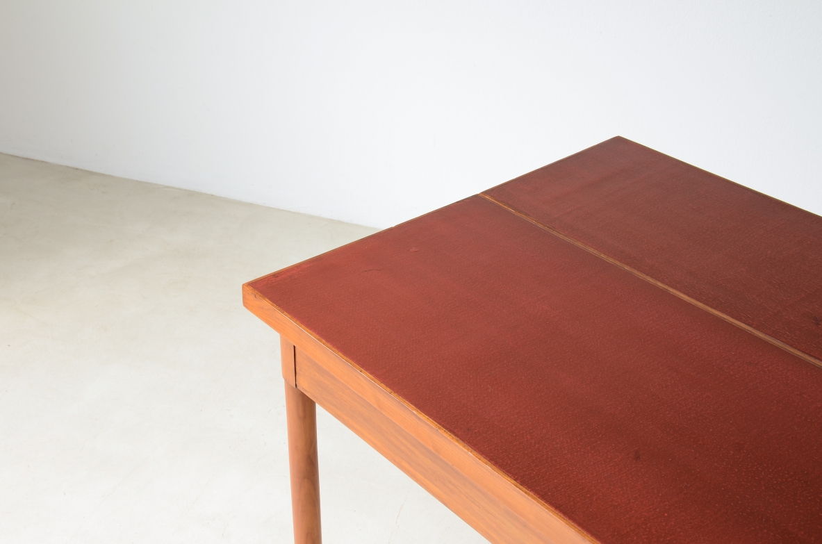 Walnut console/ dining table with red lacquered top. 1960's