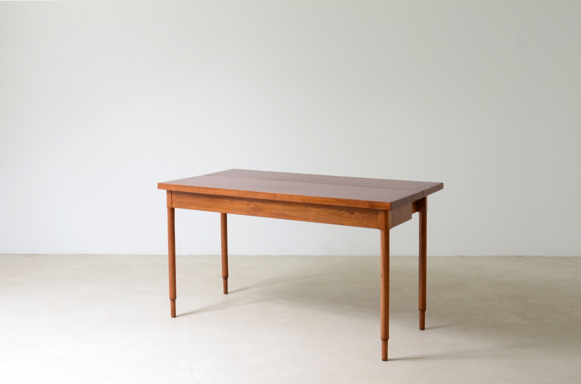 Walnut console/ dining table with red lacquered top. 1960's