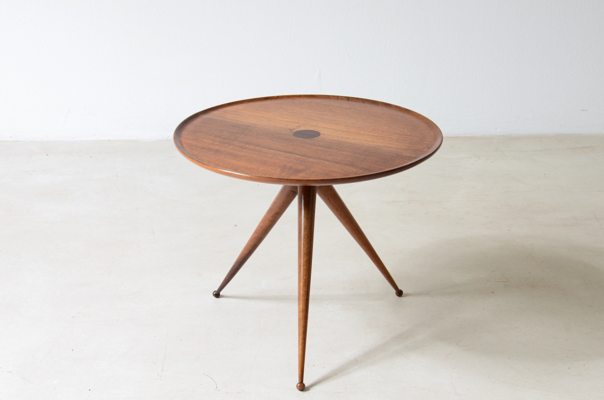 Small refined coffee table with thin turned legs and tray top.  Italian manufacture, ca. 1950.