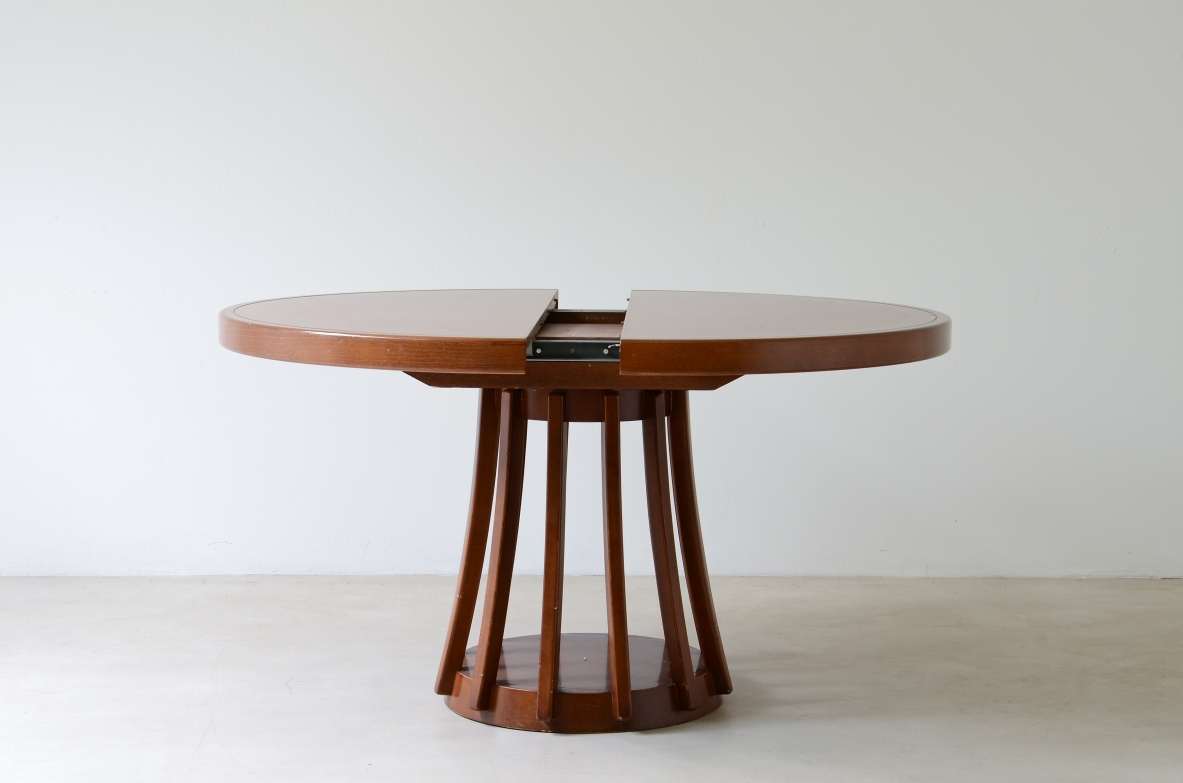 Angelo Mangiarotti Extendable walnut table, designed in 1972. Round pedestal. La Sorgente Furniture production,1972.