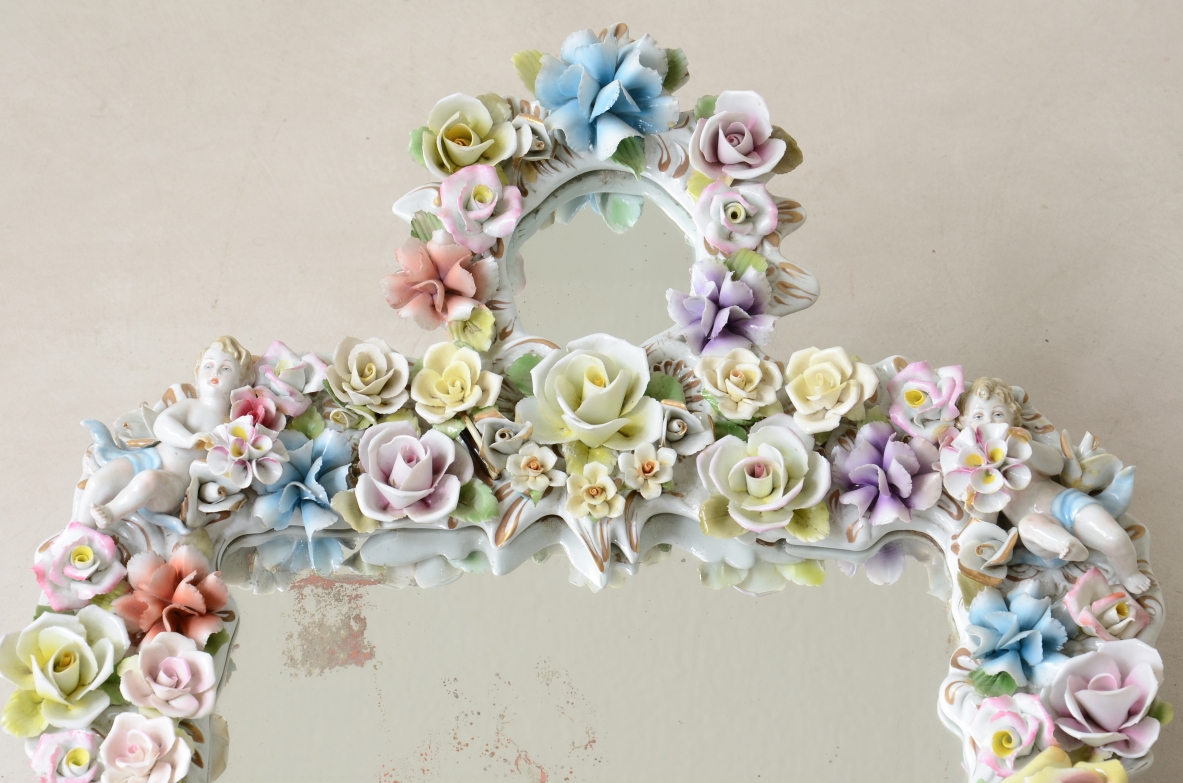 Mirror with important polychrome flower porcelain frame. Capodimonte manufacture