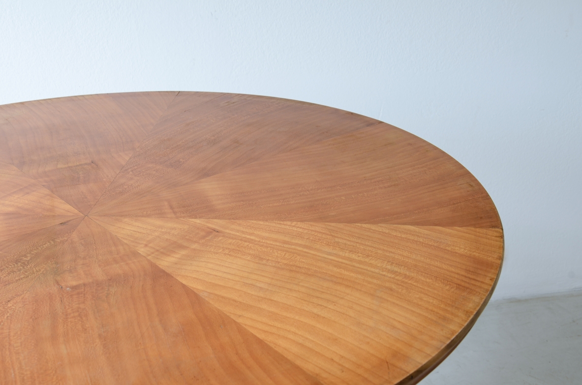 Guglielmo Ulrich Elegant cherry table with thin turned legs and veneered top. 1950