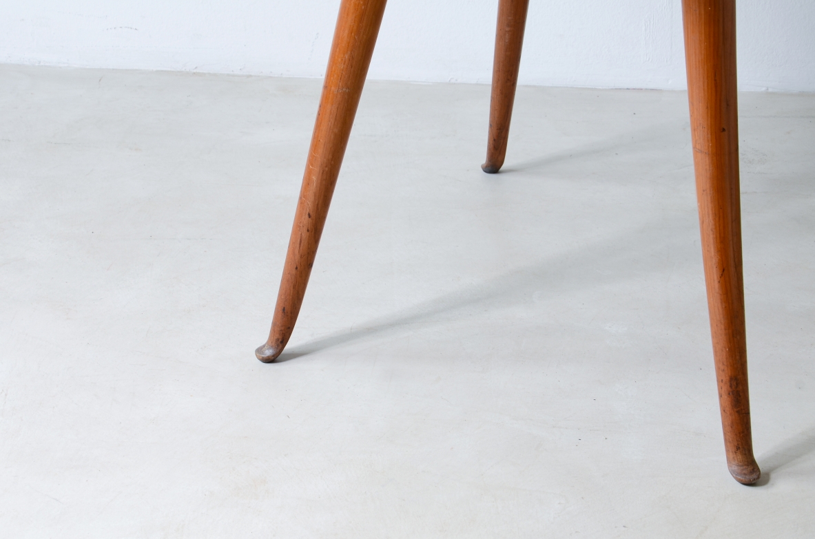 Guglielmo Ulrich Elegant cherry table with thin turned legs and veneered top. 1950