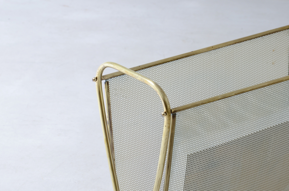 Magazine rack in perforated metal and brass.  Italian manufacture 1950.