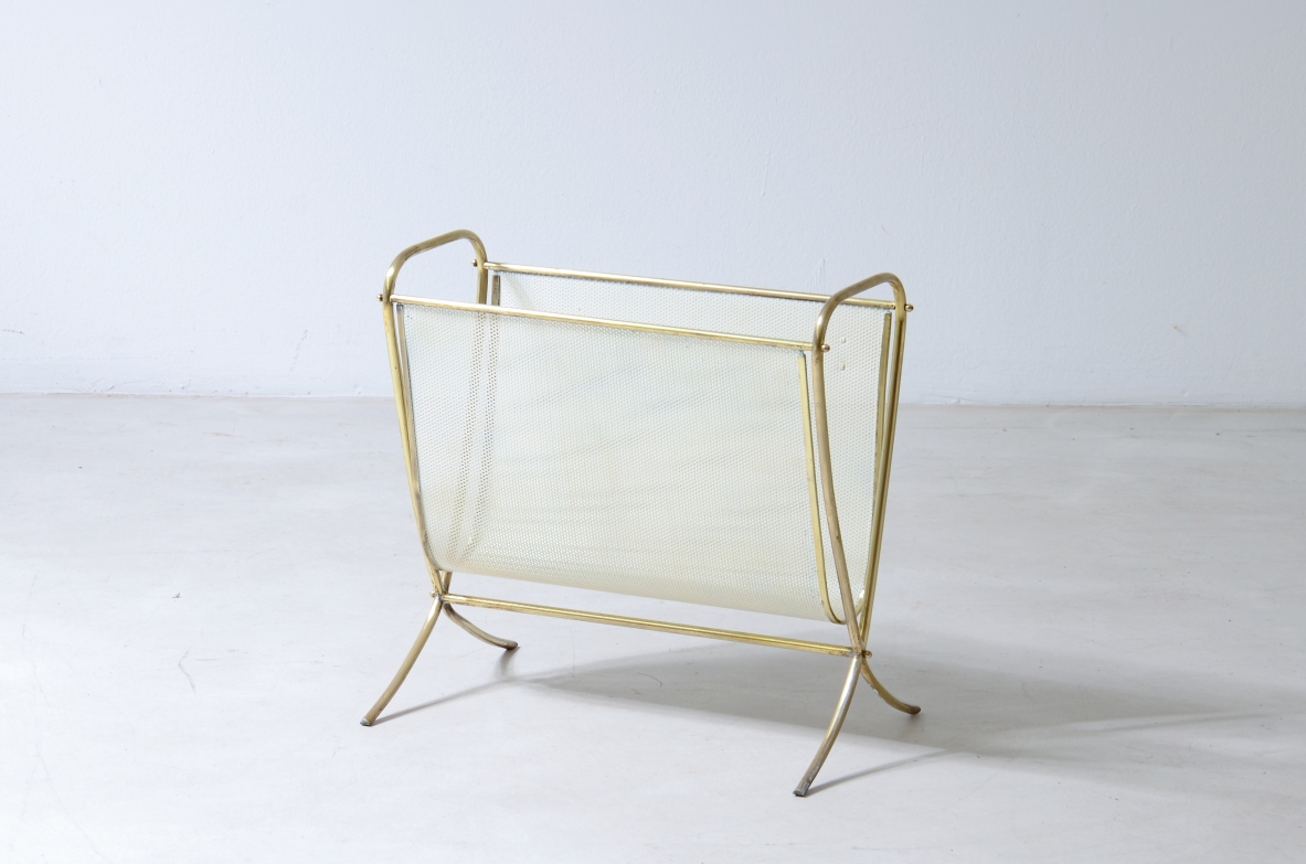 Magazine rack in perforated metal and brass.  Italian manufacture 1950.