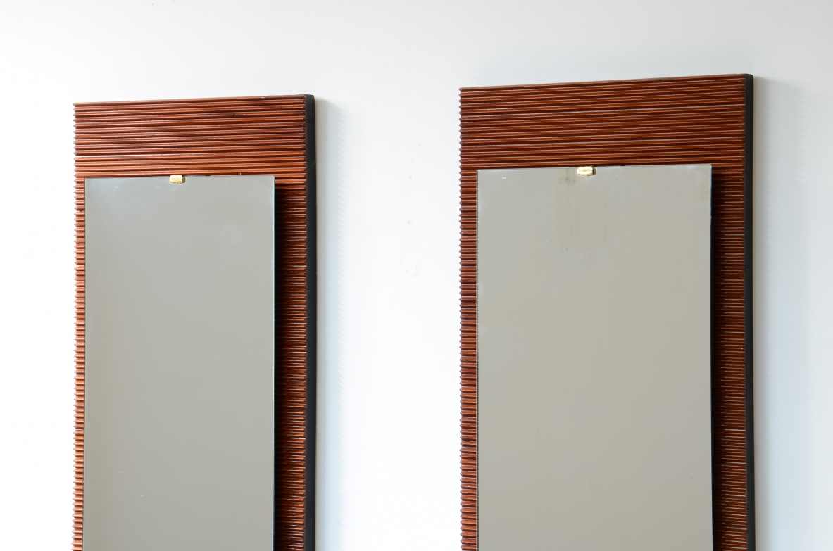 1950's Elegant pair of mirrors in reeded wood with ground mirror applied on ebonized wooden spacers