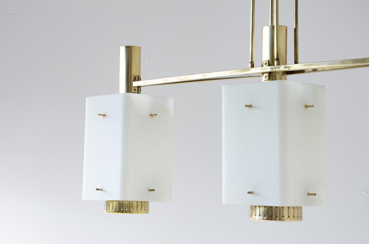 Stilnovo Elegant three-light chandelier in brass with opaline glass pendants. Bruno Gatta 1950