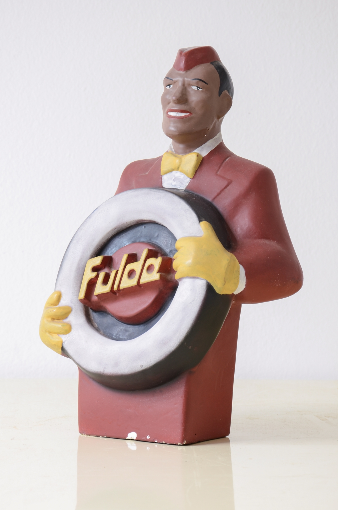 Plaster cast of 1950s advertisement.