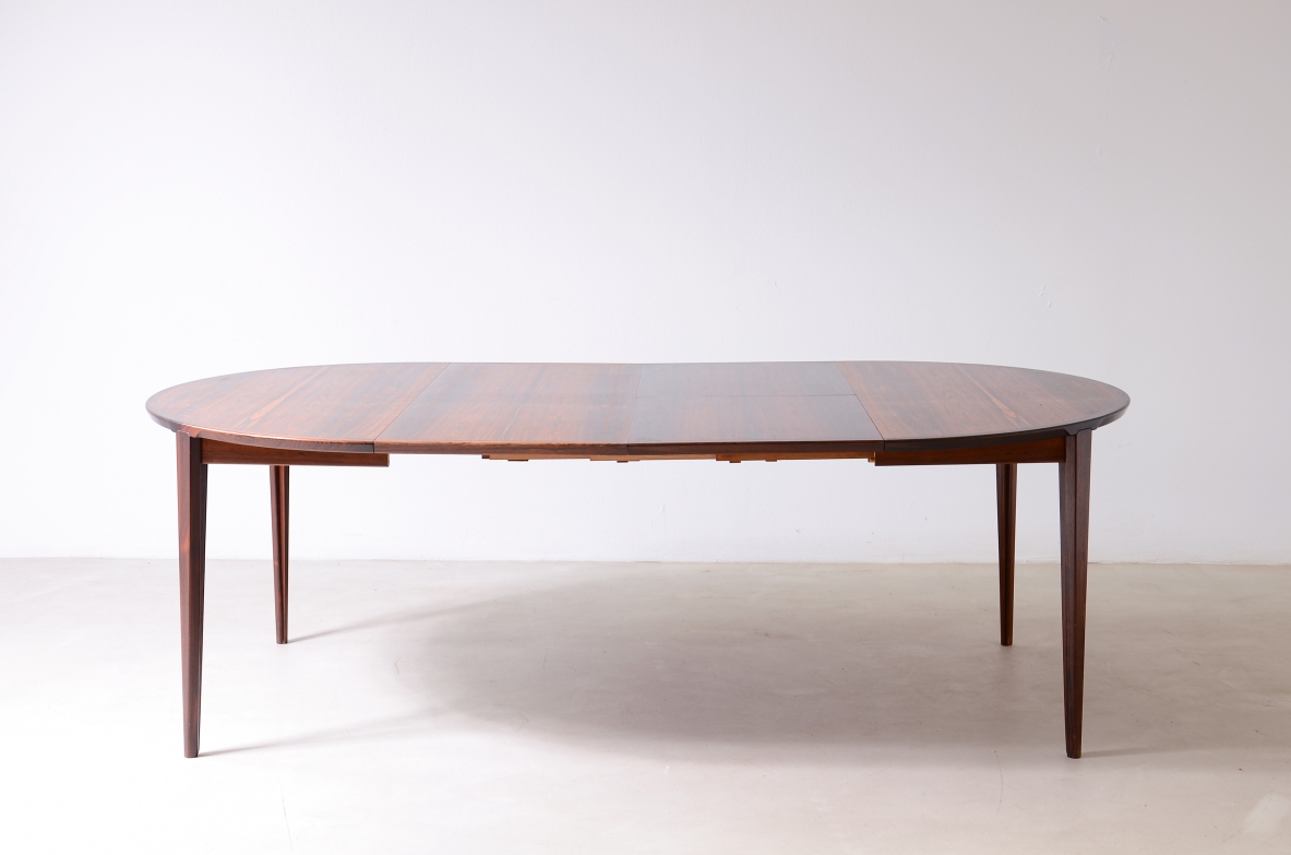 Large extendable table with four legs and two extensions and beautiful quality details.  Denmark 1960ca.