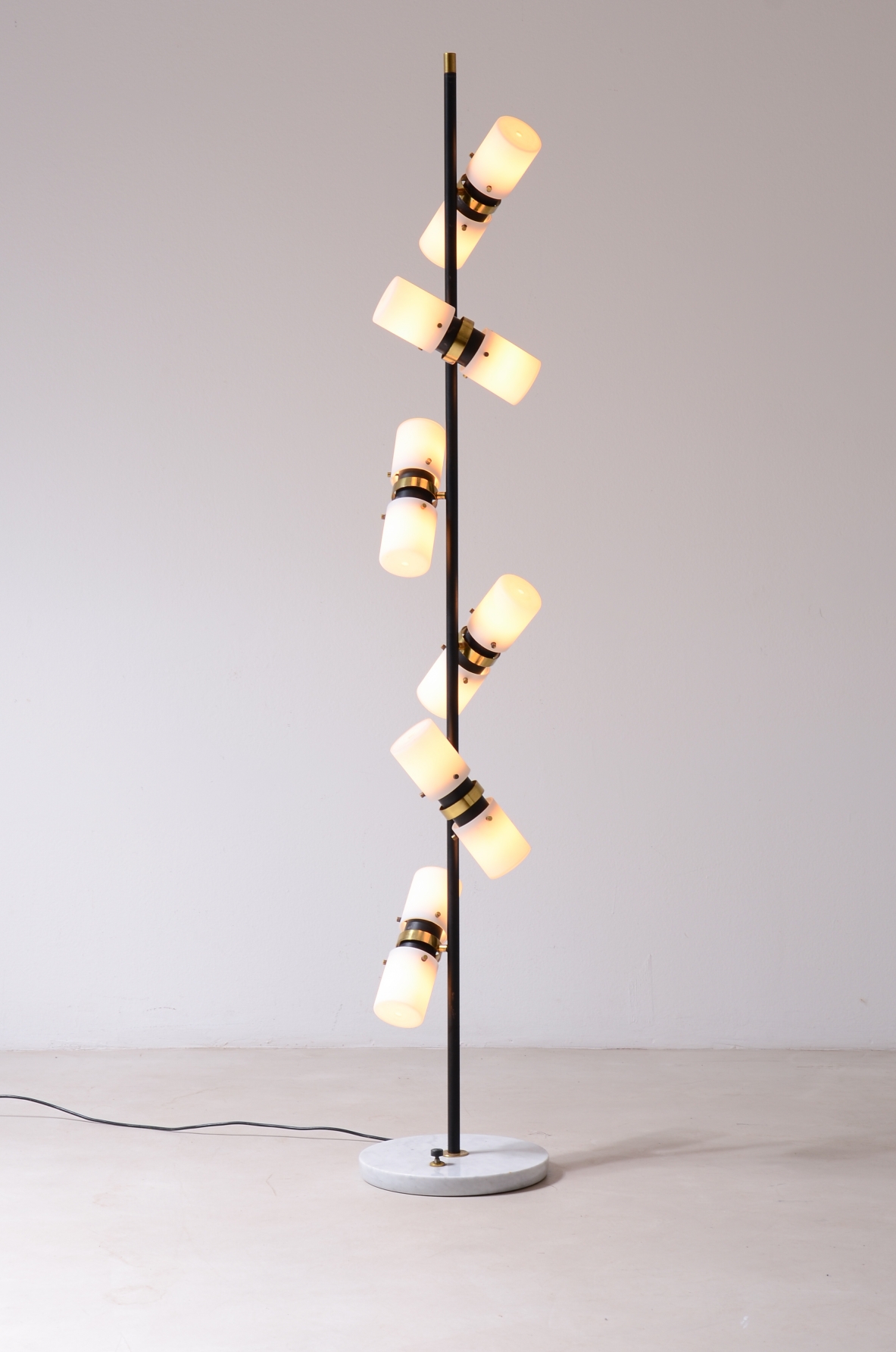 Angelo Brotto. Rare 12-light floor lamp with metal stem,  brass with opaline glass