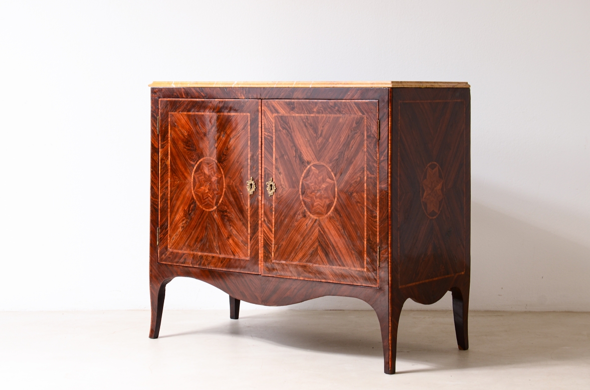 Splendid neoclassical two-door cabinet in veneered wood and inlaid with geometric motifs.Neapolitan cabinetmaking, ca. 1770.