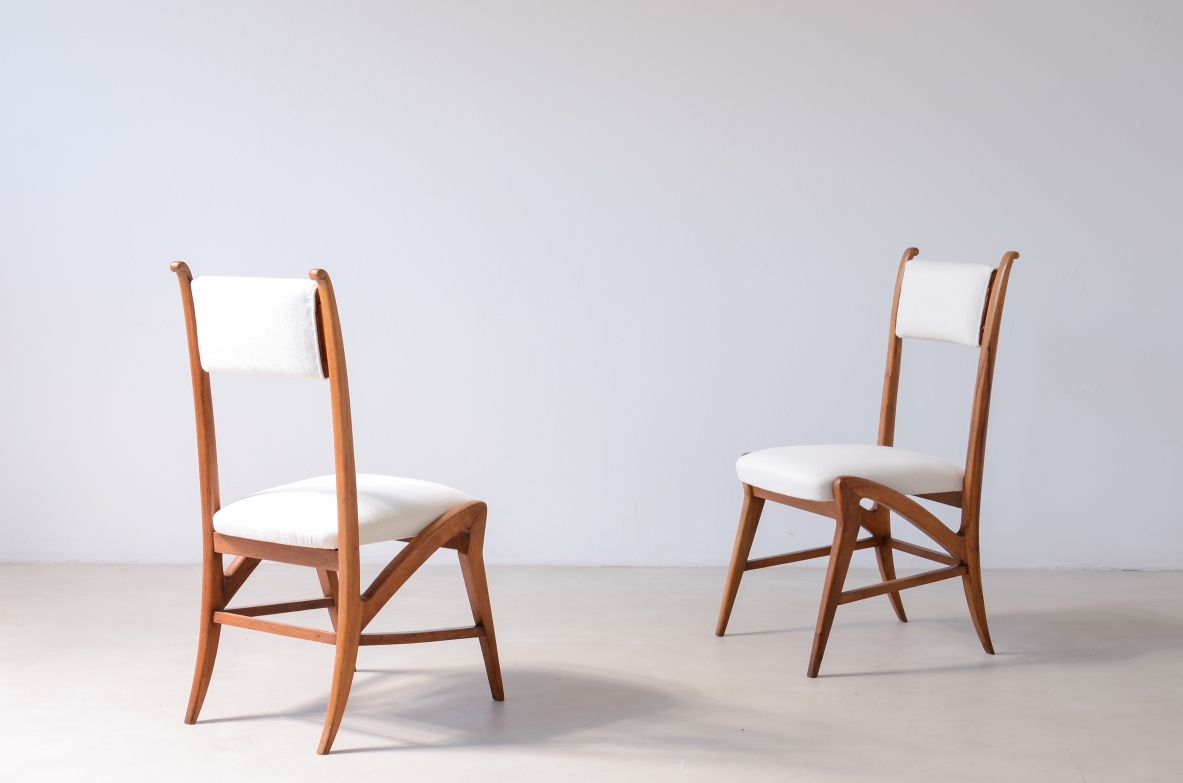 Pair of extraordinary oak chairs with upholstered fabric seat and back.  Attr. Guglielmo Pecorini, ca. 1940.
