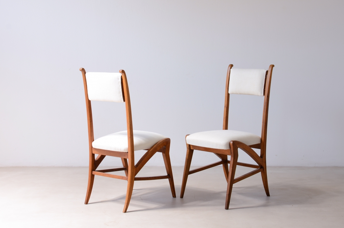 Pair of extraordinary oak chairs with upholstered fabric seat and back.  Attr. Guglielmo Pecorini, ca. 1940.