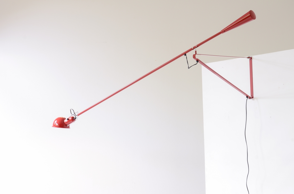 Paolo Rizzatto  Wall lamp adjustable in all directions, Original packaging of the time by Arteluce.  Production Arteluce, 1968.