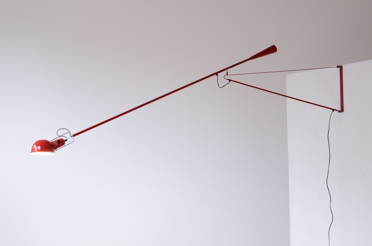 Paolo Rizzatto  Wall lamp adjustable in all directions, Original packaging of the time by Arteluce.  Production Arteluce, 1968.