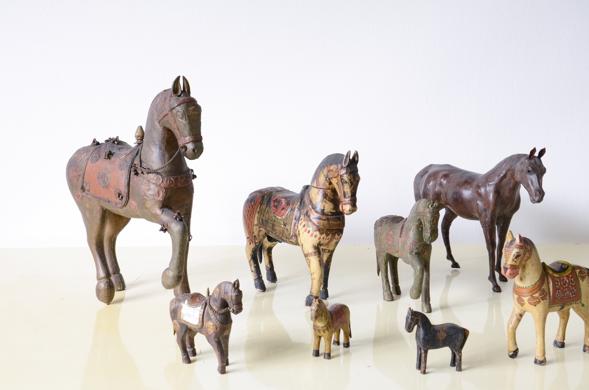Collection of nine horses made of different materials Indian manufacture, 20th century.