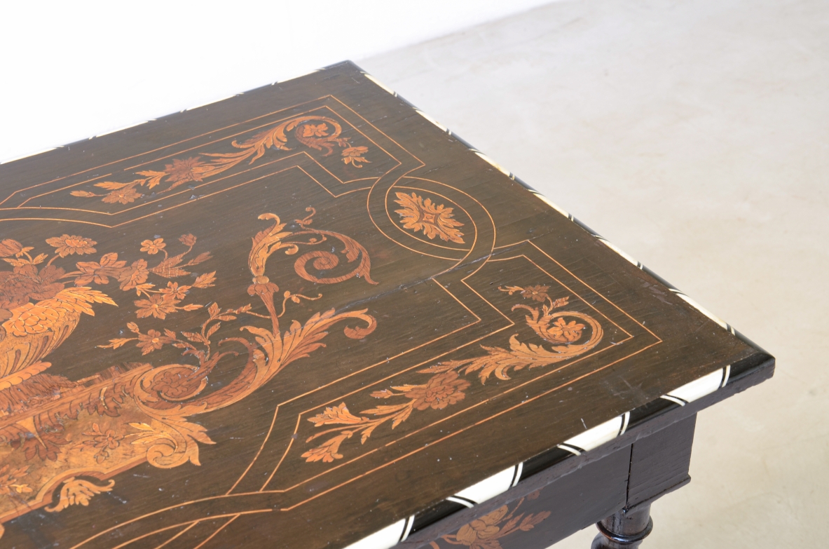 table finely inlaid in various woods and profiled in ivory 1850