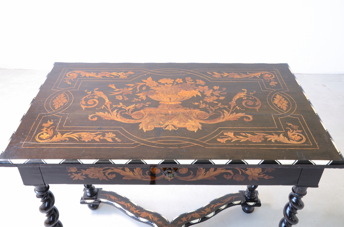 table finely inlaid in various woods and profiled in ivory 1850