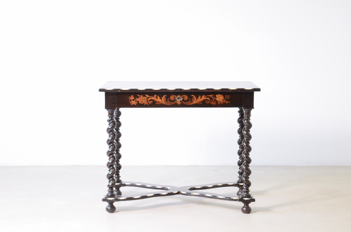 table finely inlaid in various woods and profiled in ivory 1850