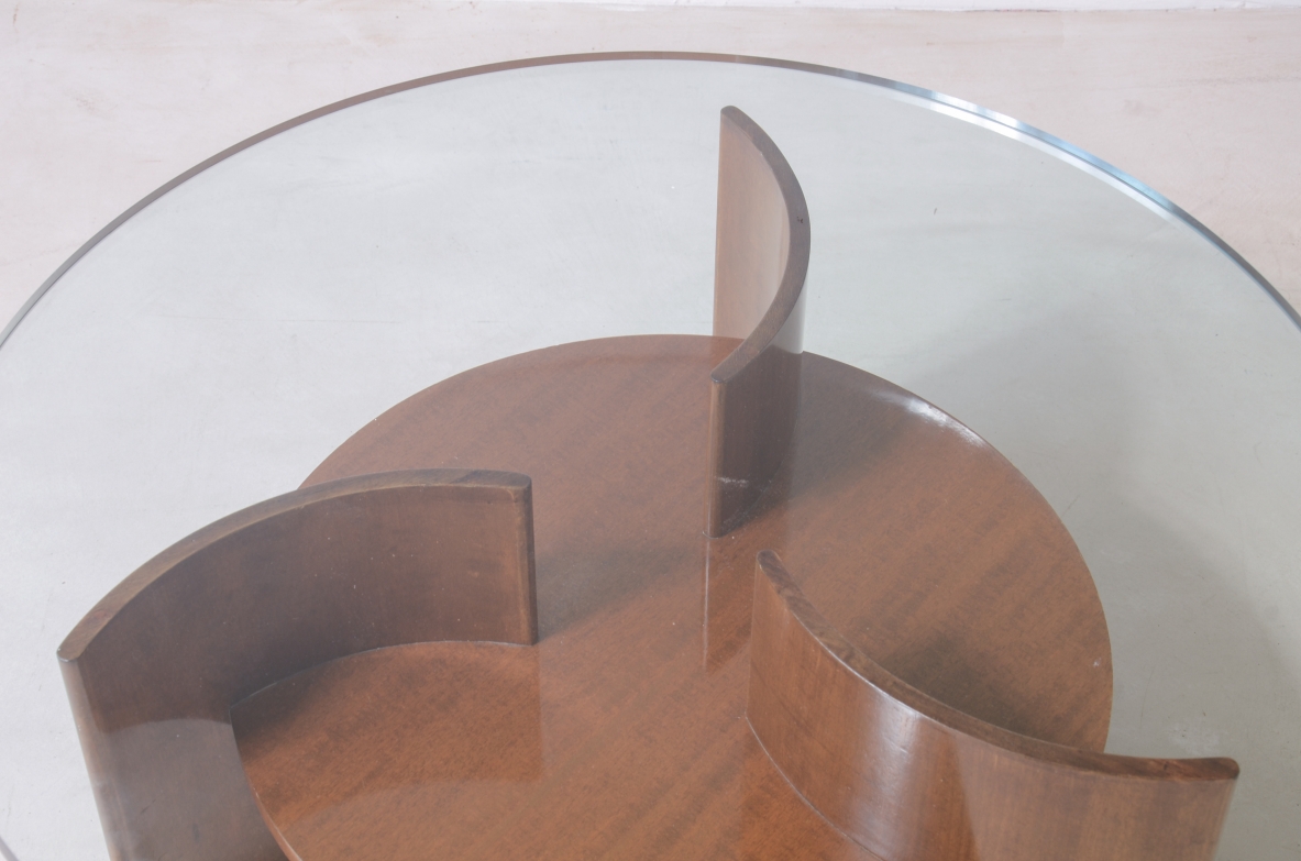 Elegant coffee table with base made up of 3 curved wooden supports 1960's
