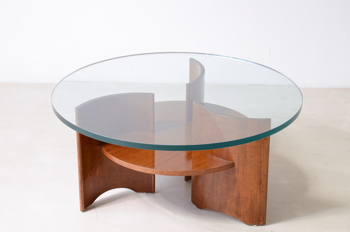 Elegant coffee table with base made up of 3 curved wooden supports 1960's