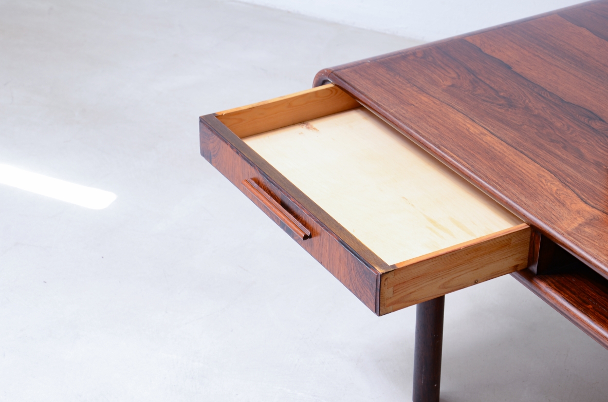 low table with two tops, an open compartment, and two drawers.Brazilian manufacture, ca. 1960.