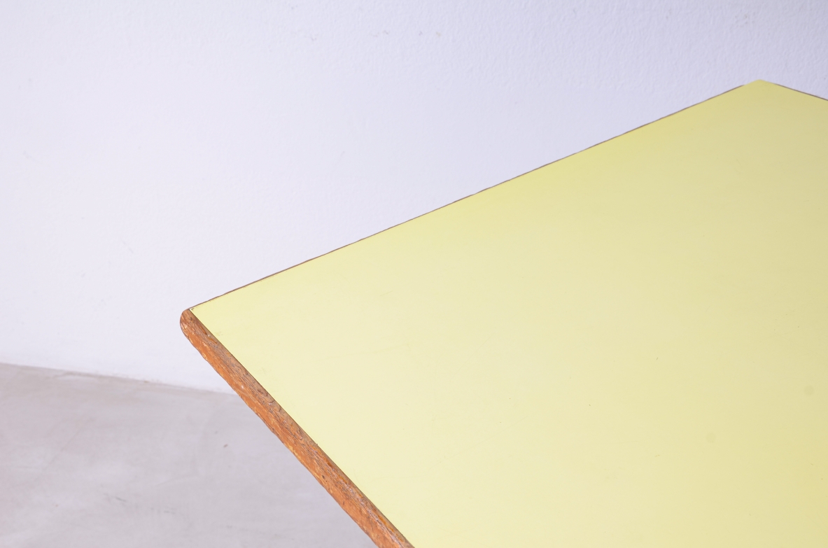 Large oak table with a pastel yellow Formica top 1955