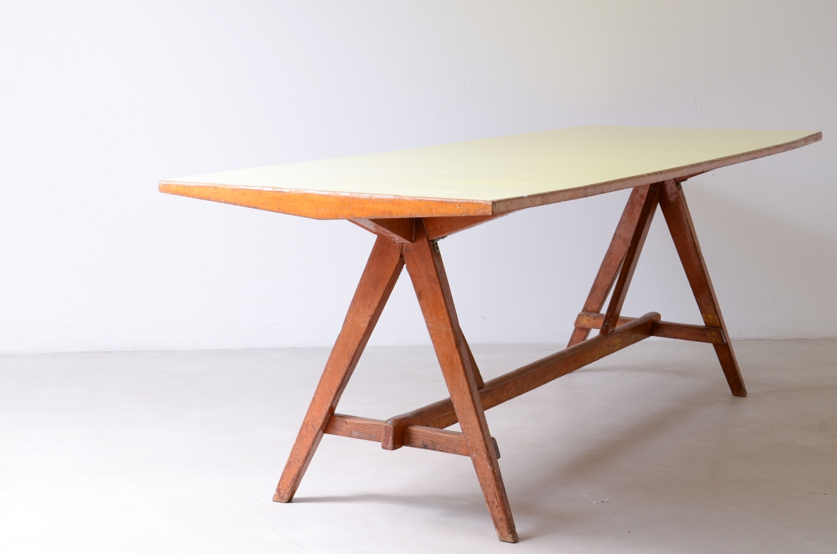 Large oak table with a pastel yellow Formica top 1955