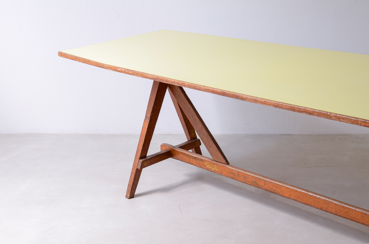 Large oak table with a pastel yellow Formica top 1955