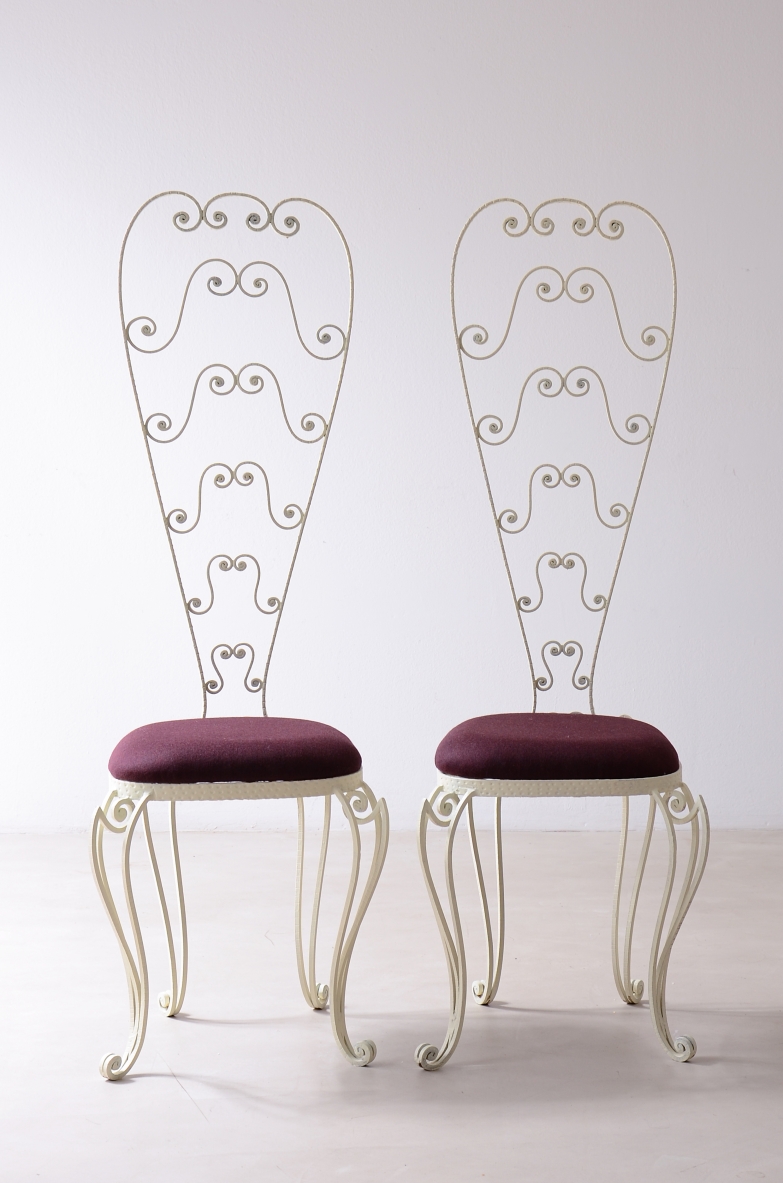 Pierluigi Colli Due sedie in ferro battuto con schienale alto decorato a riccioli, Torino 1950