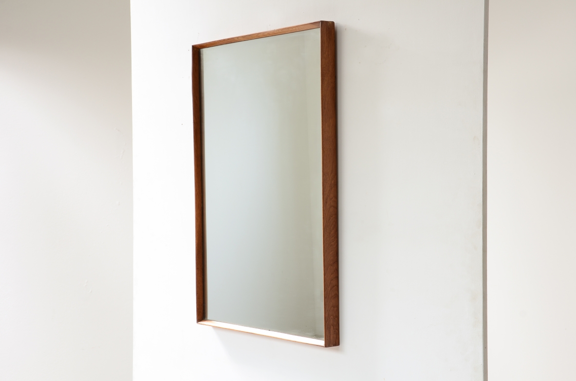Due specchiere con cornice in legno sagomato.  Manifattura anni 40.