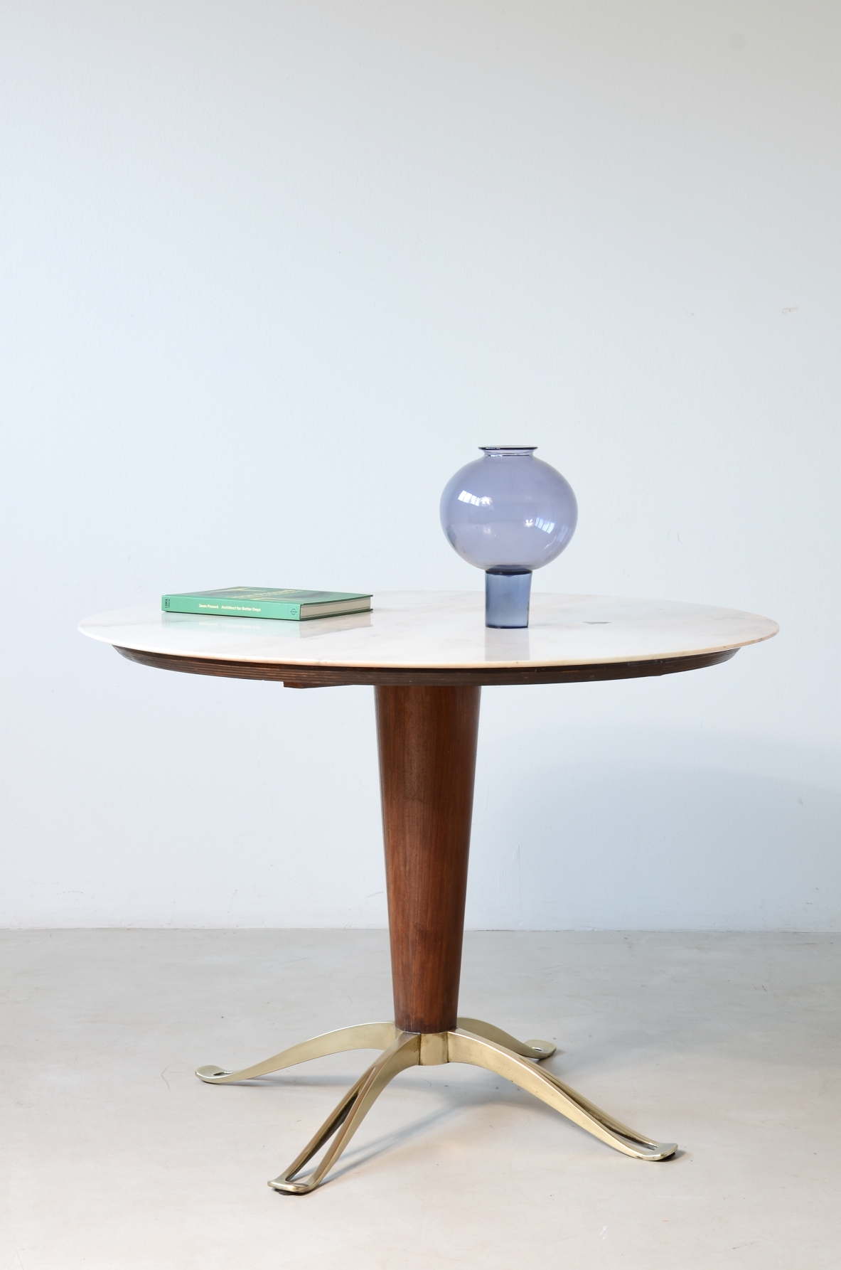 Table with a turned wooden central colum and Carrara marble top. 1950's