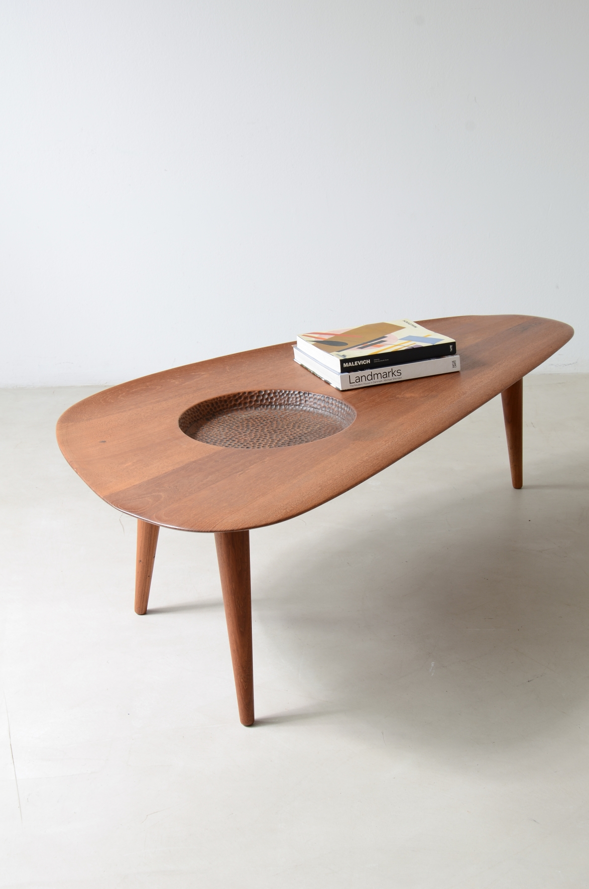 1950's  large coffee table with an organically shaped solid wood top