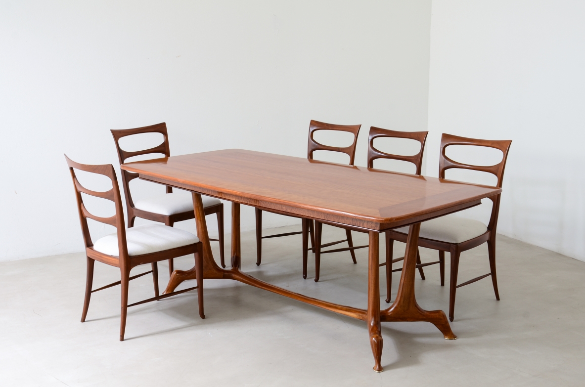 Unique cherry table with a sculptural base featuring taut lines, Made in Italy, circa 1950.